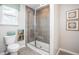 Bathroom with shower stall and toilet at 32094 Eastern Redbud Br, San Antonio, FL 33576