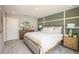 Main bedroom with large bed and dresser at 32094 Eastern Redbud Br, San Antonio, FL 33576