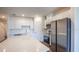 Kitchen with stainless steel appliances at 32094 Eastern Redbud Br, San Antonio, FL 33576