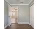 View of a bedroom doorway leading to another room with dark wood-look floors at 2558 12Th S Ave, St Petersburg, FL 33712