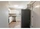 Modern kitchen featuring stainless steel appliances, white shaker cabinets, and granite counters at 2558 12Th S Ave, St Petersburg, FL 33712