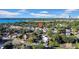 Aerial view of a residential area with houses, trees, and a city skyline in the background at 753 37Th S Ave, St Petersburg, FL 33705