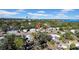 Aerial view of a residential neighborhood with trees, houses, and a city skyline in the background at 753 37Th S Ave, St Petersburg, FL 33705