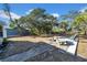 Spacious backyard with patio area, mature trees, and room for outdoor activities at 753 37Th S Ave, St Petersburg, FL 33705