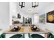 Modern kitchen with breakfast bar, stainless steel appliances, and white cabinets at 753 37Th S Ave, St Petersburg, FL 33705