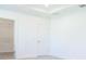 Bright bedroom with walk-in closet and white walls at 25539 Calusa Dr, Punta Gorda, FL 33955