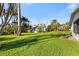 Spacious, grassy backyard with detached outbuilding at 4532 103Rd W St, Bradenton, FL 34210