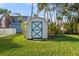 Convenient storage shed in the grassy backyard at 4532 103Rd W St, Bradenton, FL 34210