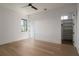 Spacious bedroom featuring wood-look flooring and a walk-in closet at 1046 Snell Isle Ne Blvd, St Petersburg, FL 33704