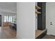Entryway with built-in storage cabinets and a view of the kitchen at 1046 Snell Isle Ne Blvd, St Petersburg, FL 33704