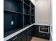 Spacious pantry with ample shelving, countertop, and built-in microwave at 1046 Snell Isle Ne Blvd, St Petersburg, FL 33704