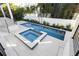 Aerial view of the pool, spa, and surrounding patio area at 1046 Snell Isle Ne Blvd, St Petersburg, FL 33704
