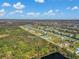 Aerial view of a house situated near a nature preserve at 243 Rotonda S Blvd, Rotonda West, FL 33947