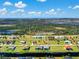 Expansive aerial view of a residential neighborhood bordering a nature preserve at 243 Rotonda S Blvd, Rotonda West, FL 33947