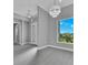 Welcoming entryway with double doors and large windows offering natural light at 243 Rotonda S Blvd, Rotonda West, FL 33947