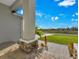 Front porch with stone accents and a landscaped walkway at 243 Rotonda S Blvd, Rotonda West, FL 33947