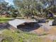 Metal-roofed livestock pens and a trailer at 2707 De Montmollin Rd, Plant City, FL 33565