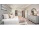 Well-appointed bedroom with ample space, plush carpeting, and a large bed at 2550 Mauritania Rd, Punta Gorda, FL 33983