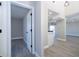 Hallway leading to a den/office with a view into the kitchen and living areas at 809 59Th Ave, St Pete Beach, FL 33706