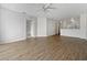 Spacious, unfurnished living room with wood-look flooring at 2061 Willow Hammock Cir # 107, Punta Gorda, FL 33983
