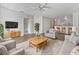 Inviting living room with stylish furniture, wood floors, and an open layout at 2061 Willow Hammock Cir # 107, Punta Gorda, FL 33983