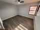 Bedroom with wood-look flooring, a ceiling fan, and ample natural light at 314 Spring Lakes Blvd # 314-U, Bradenton, FL 34210