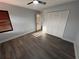 Bright bedroom with wood-look floors, ceiling fan and closet at 314 Spring Lakes Blvd # 314-U, Bradenton, FL 34210