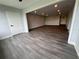 Inviting living room with wood-look flooring and a modern accent wall at 314 Spring Lakes Blvd # 314-U, Bradenton, FL 34210