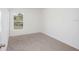 Bright bedroom with plush carpet and ample natural light at 2184 Hyatt Dr, Port Charlotte, FL 33948