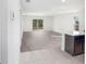 Open living room with sliding glass doors and ample natural light at 2184 Hyatt Dr, Port Charlotte, FL 33948