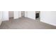 Large main bedroom with carpeted floors and ensuite bathroom at 2184 Hyatt Dr, Port Charlotte, FL 33948