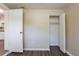 Bedroom with wood-look floors and a closet at 3723 N Garrison St, Tampa, FL 33619