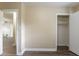 Spacious bedroom with wood-look floors and a large closet at 3723 N Garrison St, Tampa, FL 33619