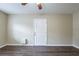 Simple bedroom with hardwood floors and neutral walls at 3723 N Garrison St, Tampa, FL 33619