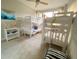 ' bedroom with bunk beds, nautical decor, and natural light at 5855 Midnight Pass Rd # 108, Sarasota, FL 34242