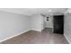 Bonus room with tile floor, refrigerator, and a door at 603 W Emma St, Tampa, FL 33603
