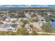 Neighborhood wide aerial view showing a canal at 9636 Cypress Harbor Dr, Gibsonton, FL 33534