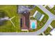 Bird's-eye view of the community center, pool and solar panels at 4920 Sedeno Dr, Zephyrhills, FL 33541