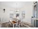 Dining room with a table, chairs, and a built-in hutch at 4920 Sedeno Dr, Zephyrhills, FL 33541