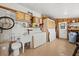Laundry room with washer, dryer, utility sink, and storage at 4920 Sedeno Dr, Zephyrhills, FL 33541