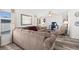 Living room with a large sectional sofa, recliner, and coffee table at 4920 Sedeno Dr, Zephyrhills, FL 33541