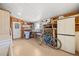 Workshop or utility room with workbench, tools and storage at 4920 Sedeno Dr, Zephyrhills, FL 33541