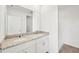 Bright bathroom featuring double sinks, granite countertops, and a walk-in shower at 14061 Crutchfield Ct, Parrish, FL 34219