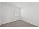 Cozy bedroom with neutral carpet and a single window at 14061 Crutchfield Ct, Parrish, FL 34219