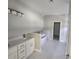Elegant bathroom featuring a freestanding tub and double vanity at 2840 S Biscayne Dr, North Port, FL 34287