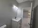 Simple bathroom with single vanity and toilet at 2840 S Biscayne Dr, North Port, FL 34287