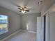 Comfortable bedroom with a window and ceiling fan at 2840 S Biscayne Dr, North Port, FL 34287