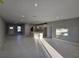 Open concept kitchen and living area with modern finishes at 2840 S Biscayne Dr, North Port, FL 34287