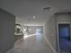Open concept kitchen and living area with modern finishes and island at 2840 S Biscayne Dr, North Port, FL 34287