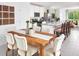 Bright dining room with a wood table and seating for six at 3902 Radiant Mountain Dr, Plant City, FL 33565